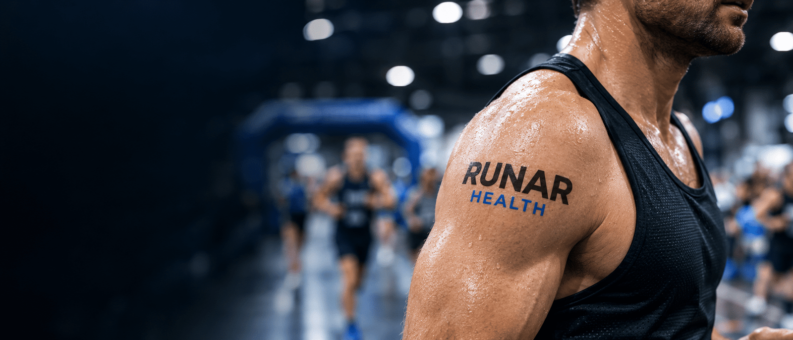 Runar Health temporary tattoo on an athlete’s shoulder at a HYROX fitness event